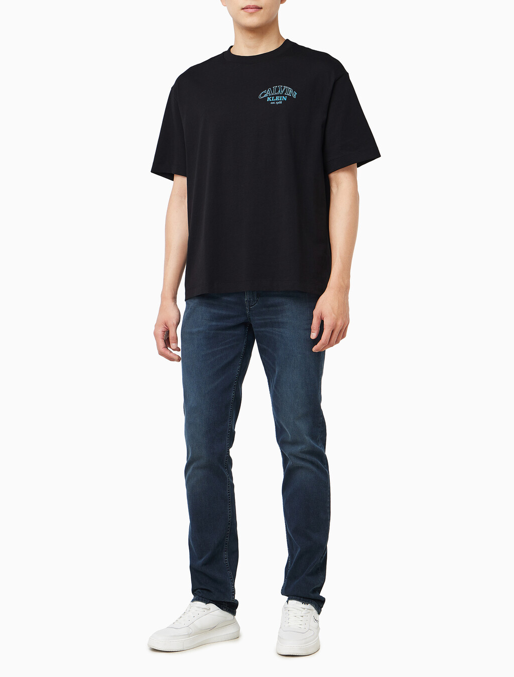 Buy 릴렉스드 저지 엠보스드 모노로고 티 in color BLACK