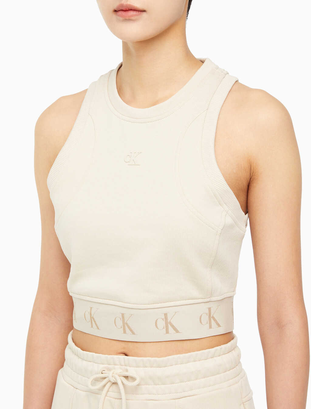 Buy 여성 리피트 크롭 로고 탱크 탑 in color CLASSIC BEIGE