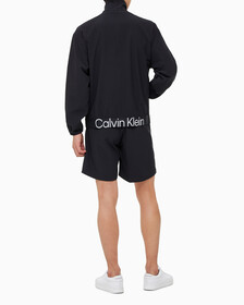 Buy 남성 리플렉티브 로고 레귤러 핏 윈드 재킷 in color BLACK