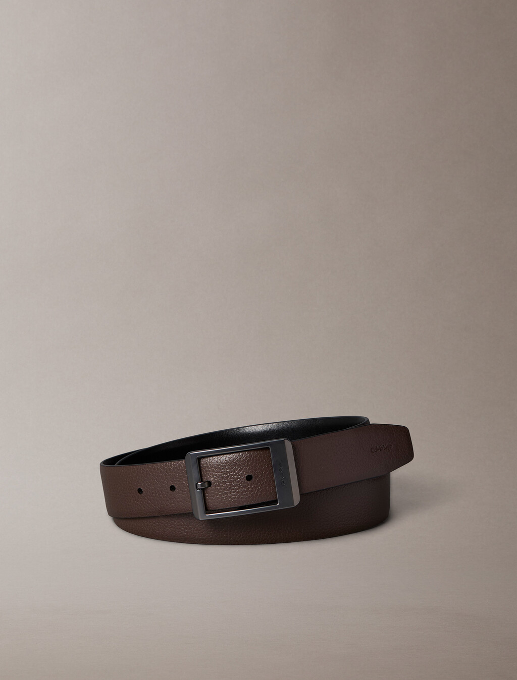 Buy 남성 센터 바 리버서블 벨트 in color Black AOP / Black / Matte Gunmetal
