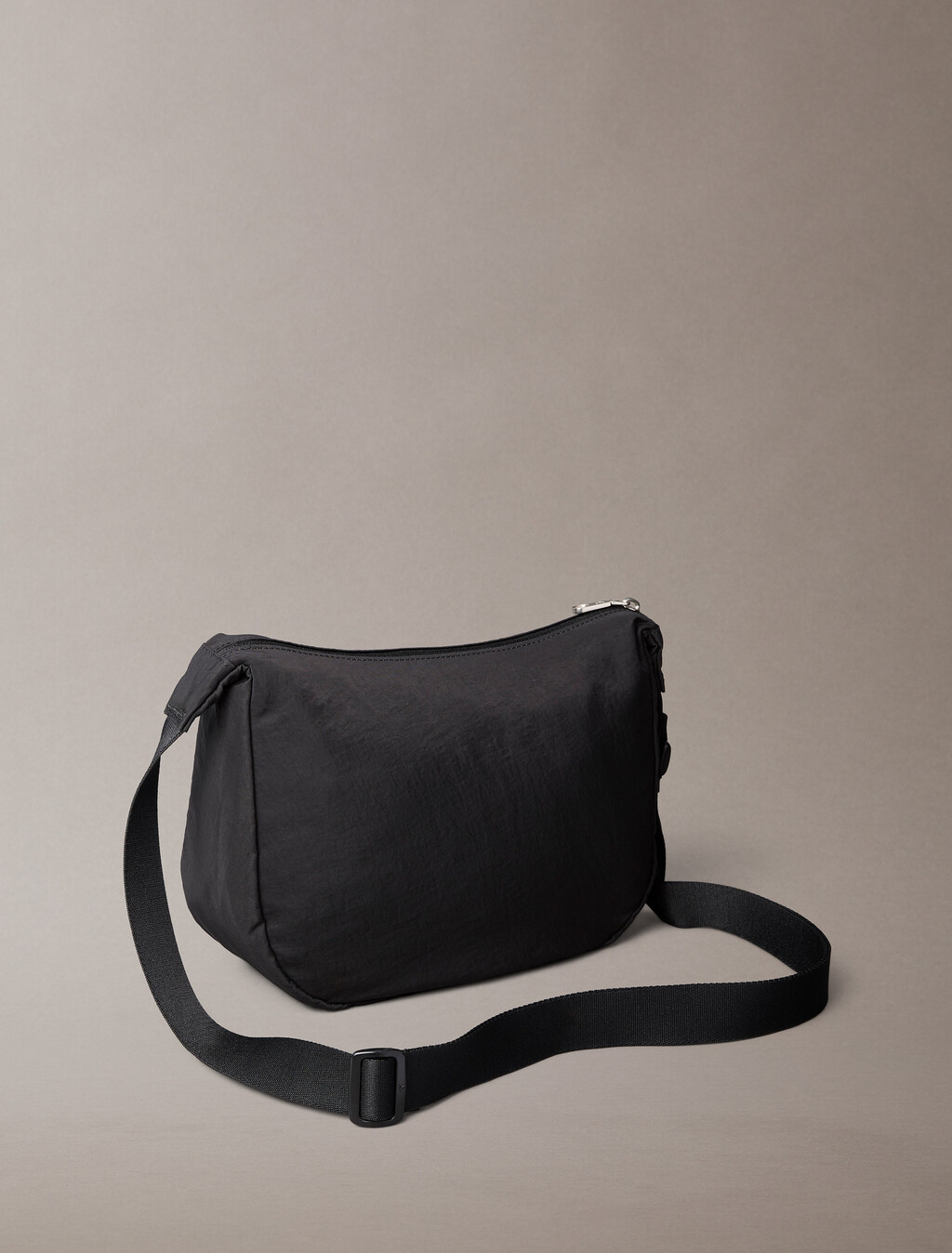 Buy 남성 모노로고 크링클 나일론 스몰 슬링 백 in color BLACK