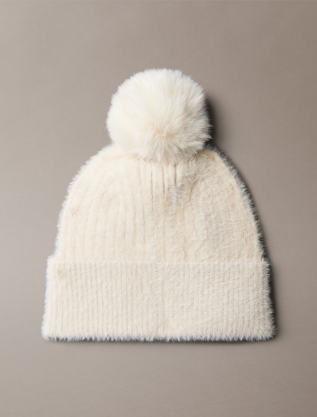 Buy 여성 퍼지 립 폼폼 비니 in color Ivory