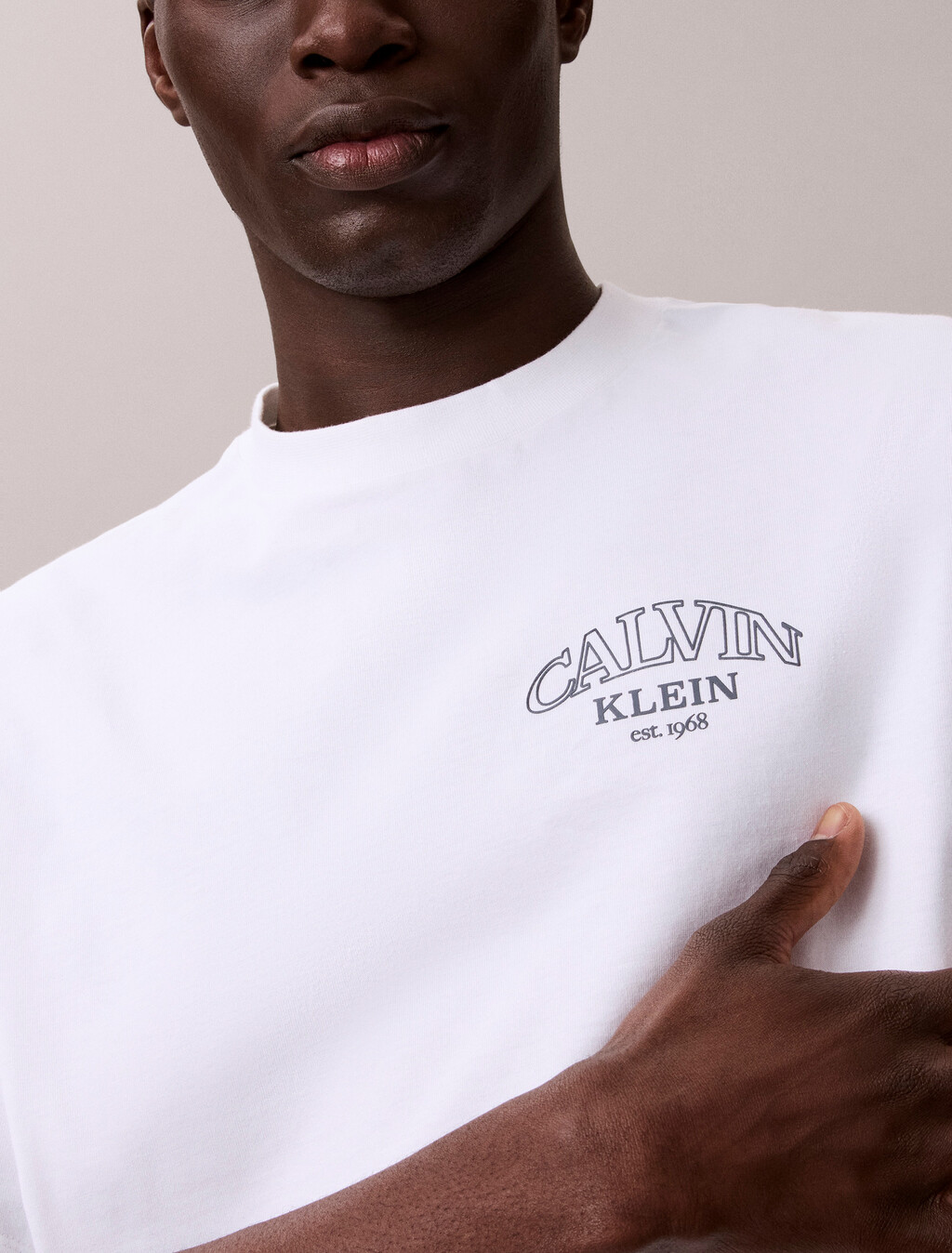 Buy 릴렉스드 저지 엠보스드 모노로고 티 in color BRIGHT WHITE