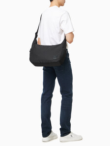 Buy 남성 유틸리티 엠블럼 크로스바디 in color BLACK