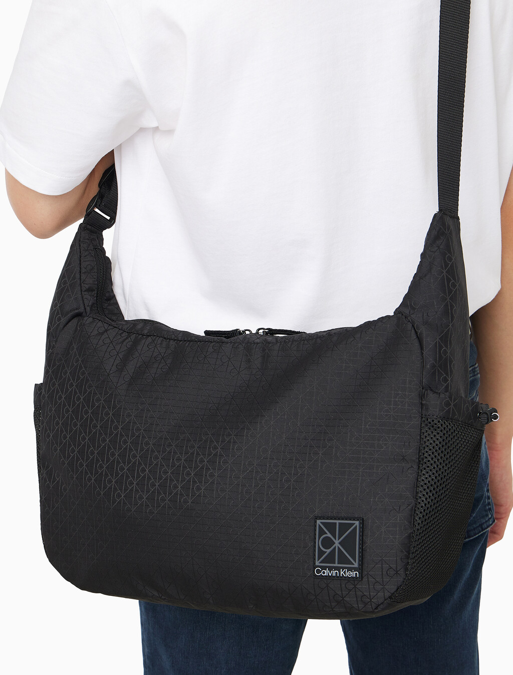 Buy 남성 유틸리티 엠블럼 크로스바디 in color BLACK