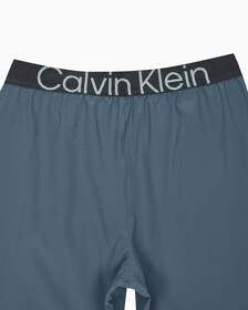 Buy 남성 레귤러핏 우븐 쇼츠 in color OCEAN TEAL/ BLK