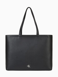 Buy 여성 CKJ 미니멀 모노그램 슬림 토트 백 in color BLACK