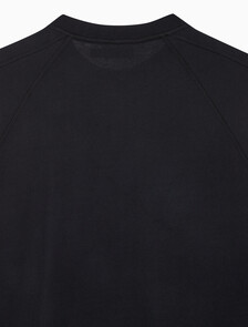 Buy [손흥민 캡슐] 남성 박시 롱슬리브 티셔츠 in color BLACK BEAUTY