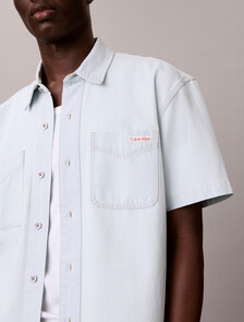 Buy 숏슬리브 블리치 아웃 데님 셔츠 in color White Blue