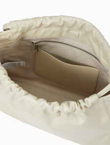 Buy 여성 CKJ 드로우스트링 숄더백 in color BEIGE