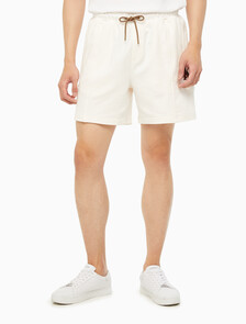 Buy 남성 시즈널 트리플 모노그램 스웨트 쇼츠 in color ANCIENT WHITE