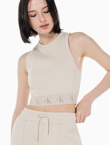 Buy 여성 리피트 크롭 로고 탱크 탑 in color CLASSIC BEIGE