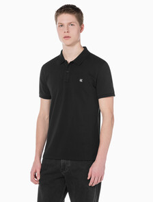 Buy 남성 슬림핏 CK 로고 뱃지  폴로 티셔츠 in color CK BLACK