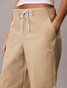 Buy 여성 크링클 나일론 팬츠 in color CORNSTALK