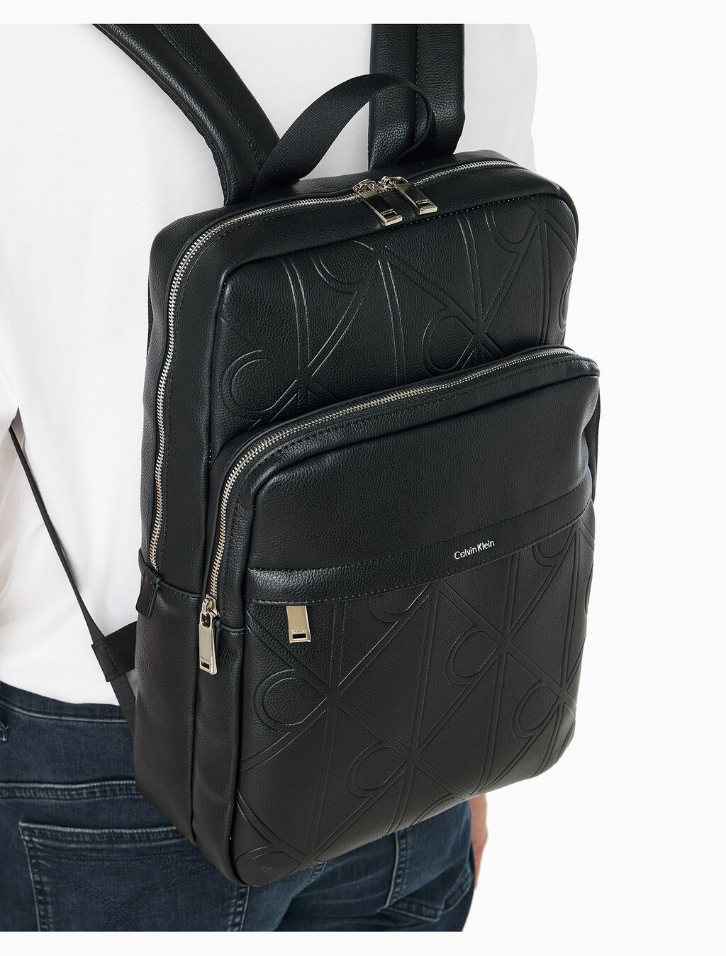 Buy 남성 라지 엠보스드 엠블럼 슬림 스퀘어 백팩 in color BLACK