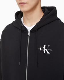 Buy 남녀공용 릴렉스핏 모노그램 집업 후디 in color CK BLACK