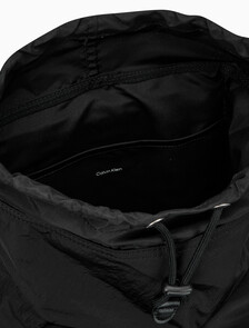 Buy CKJ 시티 나일론 백팩 in color BLACK