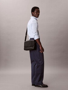 Buy 남성 라지 엠보스드 엠블럼 플랩 메신저 in color BLACK