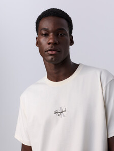 Buy Jung Kook for Calvin Klein 남성 릴렉스 핏 모노그램 로고 반팔 티셔츠 in color TOFU