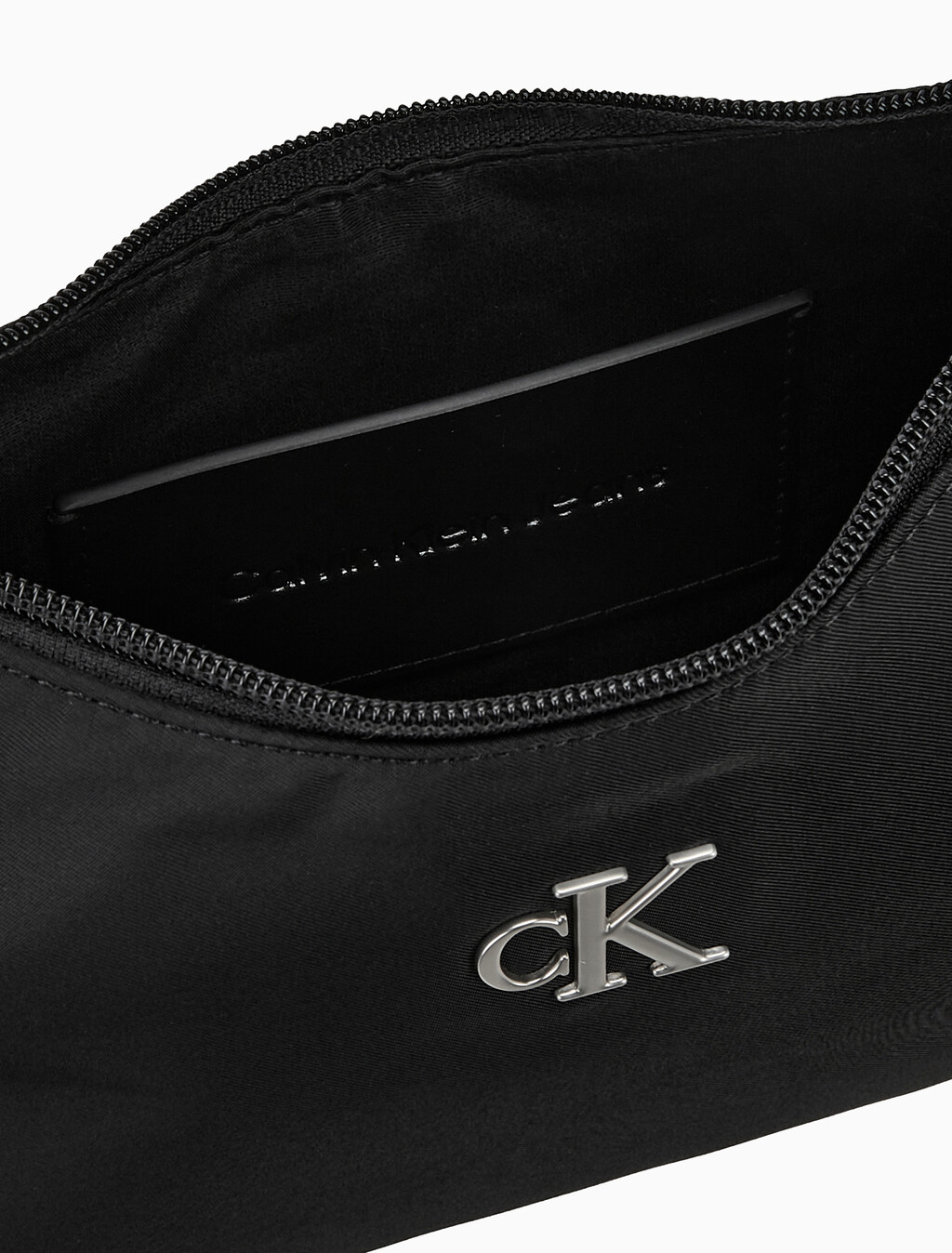 Buy 여성 CKJ 슬릭 숄더 백 in color BLACK