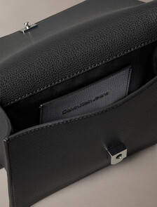 Buy 여성 CKJ 미니멀 모노그램 플랩 체인 숄더백 in color BLACK