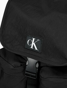Buy CKJ 시티 나일론 백팩 in color BLACK