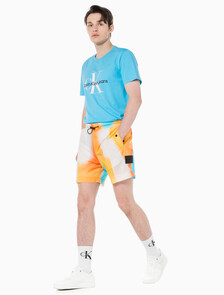 Buy 남성 올오버 그래픽 프린트 쇼츠 in color ANCIENT WHITE/EGGSHELL