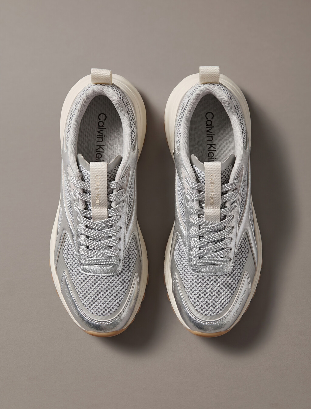 Buy 여성 하이크 러너 CK 스트라이프 메쉬 레더 메탈 스니커즈 in color Silver/Dk Ecru/Light Gum