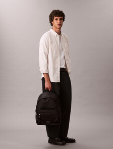 Buy 남녀공용 나일론 슬릭 라운드 백팩 in color BLACK