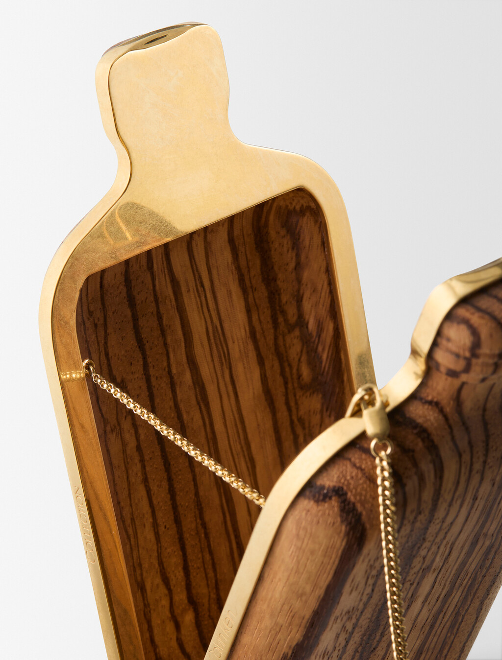 Buy THE ONE CLUTCH in color ZEBRANO