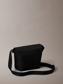 Buy 남성 볼드 로고 나일론 헤더 스몰 플랩 메신저 백 in color BLACK