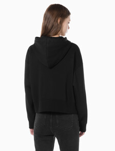 Buy 여성 아카이브 릴렉스핏 CK 스몰 로고 크롭 기모 후드 집업 in color BLACK