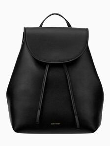 Buy 여성 엠보스드 로고 플랩 백팩 in color Black/Toasted Coconut
