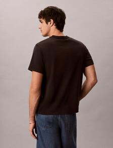 Buy 애시드 워시 모노로고 그래픽 티 in color BLACK