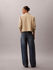 Buy 여성 커브드 배기 데님 in color Mid Blue