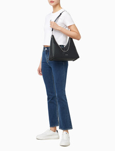 Buy 여성 하드웨어 엠블럼 페블 호보 백 in color BLACK