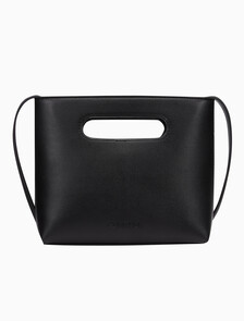 Buy 여성 CKJ 엘리멘털 스몰 컷아웃 토트백 in color BLACK BEAUTY