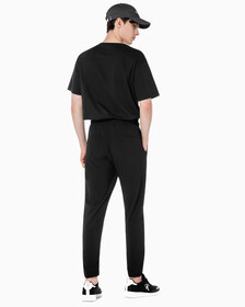 Buy 남성 레귤러 핏 에센셜 하이 스트레치 기능성 우븐 팬츠 in color BLACK