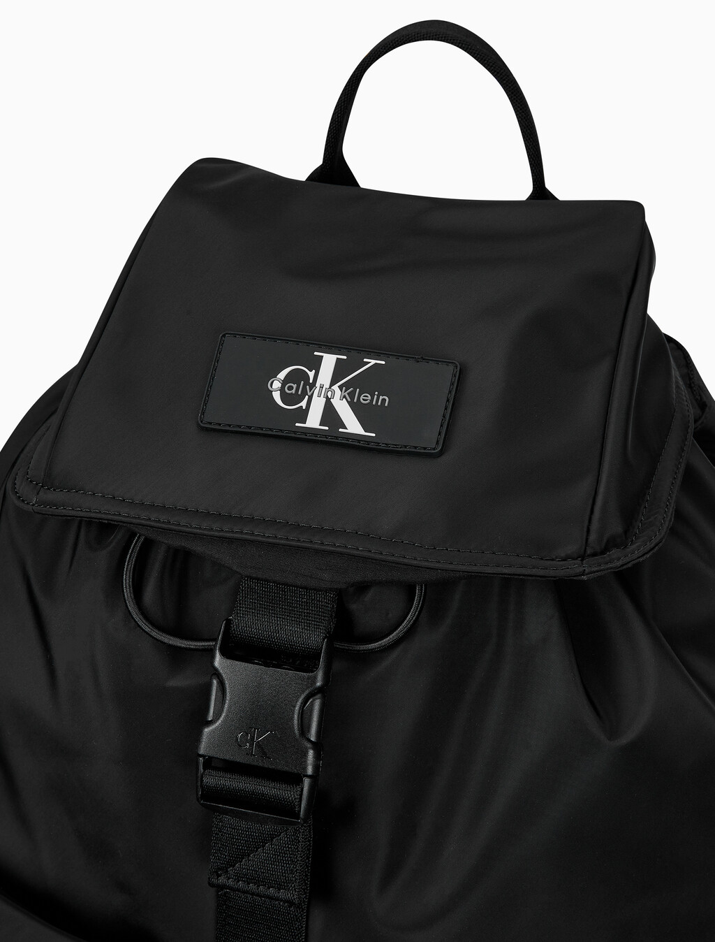 Buy CKJ 리버서블 플랩 투포켓 백팩 in color BLACK