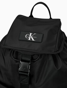 Buy CKJ 리버서블 플랩 투포켓 백팩 in color BLACK