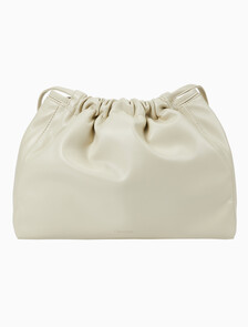 Buy 여성 CKJ 드로우스트링 숄더백 in color BEIGE