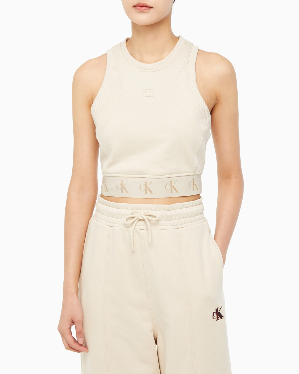 Buy 여성 리피트 크롭 로고 탱크 탑 in color CLASSIC BEIGE