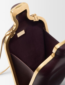 Buy THE ONE CLUTCH CULT CK ONE in color Cocoa