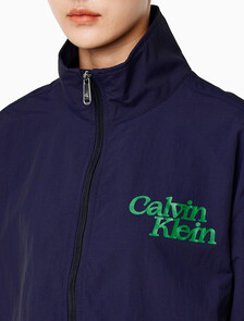 Buy 여성 컬러블락 나일론 풀오버 자켓 in color ECLIPSE / CASHMERE BLUE