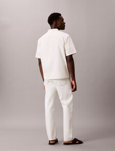 Buy 솔리드 워시드 포플린 릴렉스 숏슬리브 셔츠 in color TOFU