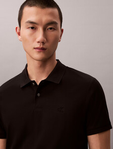 Buy 클래식 인터록 폴로 티 in color BLACK