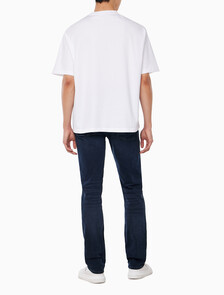 Buy 남성 릴렉스핏 뉴욕 바시티 로고 반팔 티셔츠 in color BRILLIANT WHITE