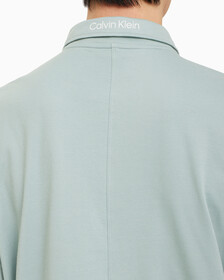 Buy 남성 리플렉티브 로고 레귤러 핏 기능성 집업 폴로 티셔츠 in color GREEN MILIEU