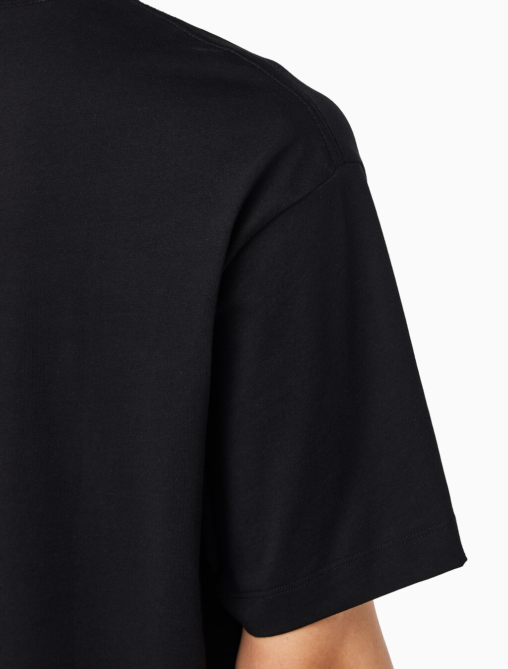 Buy 릴렉스드 저지 엠보스드 모노로고 티 in color BLACK