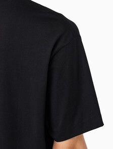 Buy 릴렉스드 저지 엠보스드 모노로고 티 in color BLACK